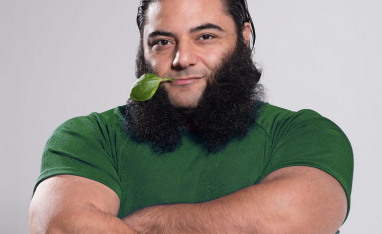 Vegan strongman Patrik Baboumian eats some spinach